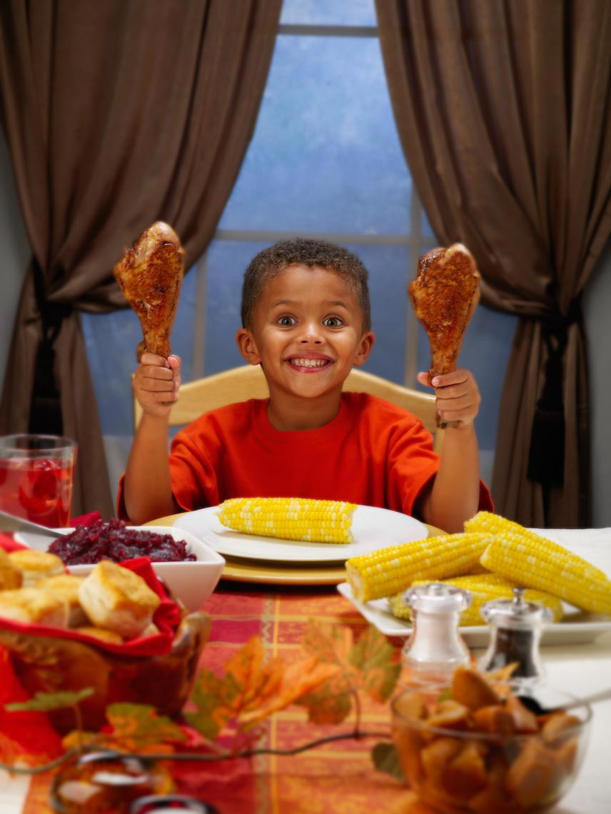 Lifestyle Photography | Boy holding turkey legs