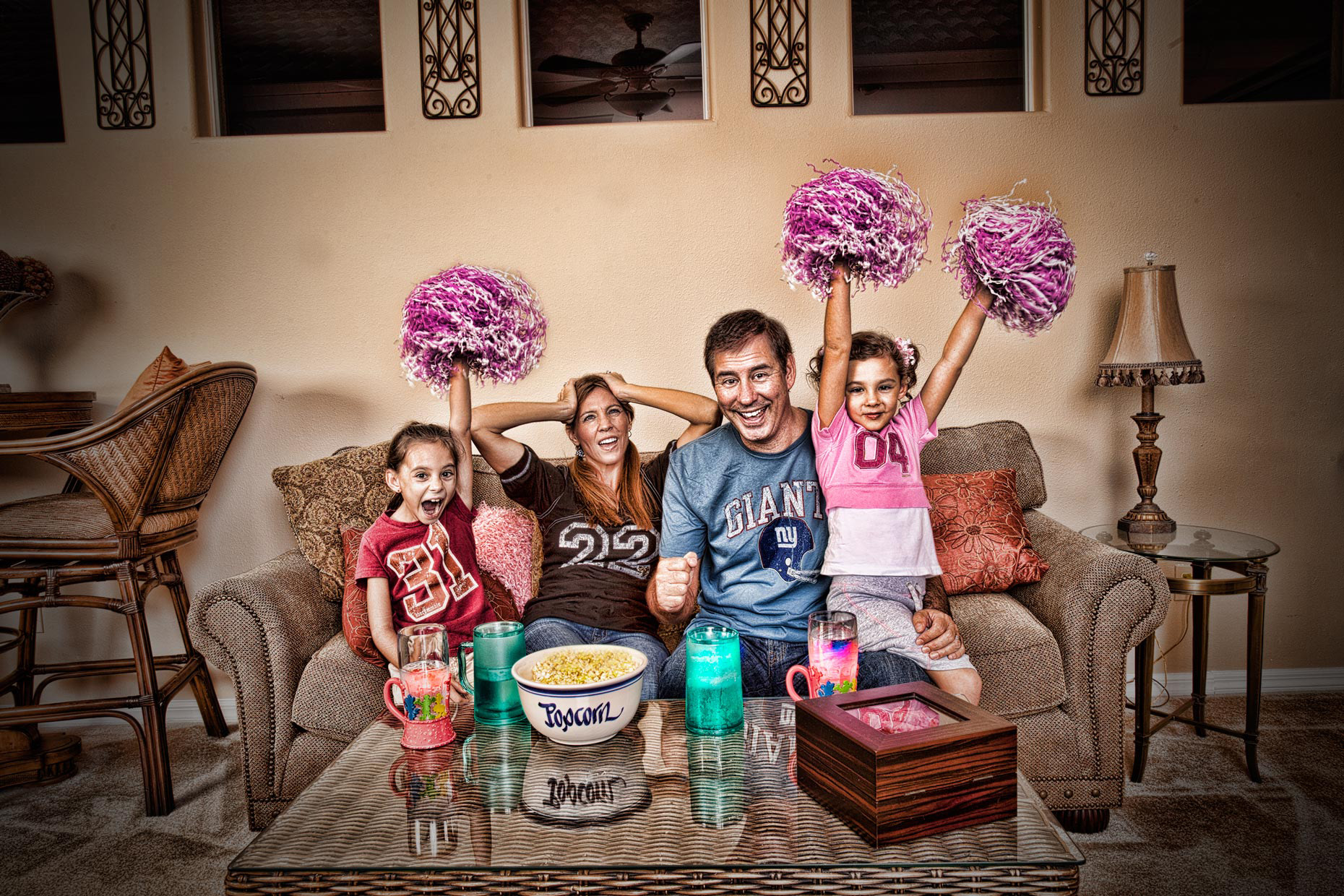 Lifestyle Photographer | People watching Football game