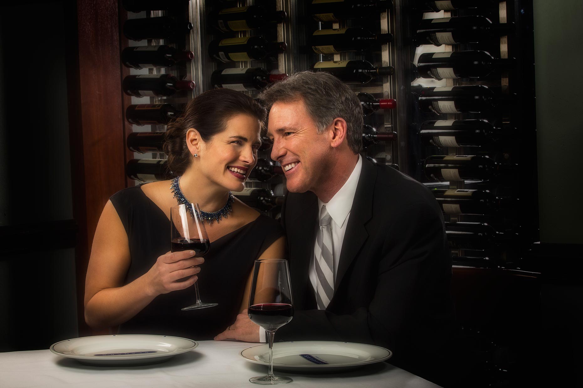 Lifestyle Photography | Hotel & Resort Photogrpapher|Couple drinking wine at Seagars RestaurantL