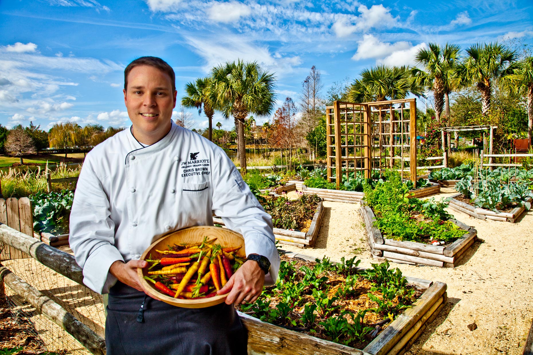 Chef Photogrpahy | Hotel & Resort Photogrpaher|Chef Holding Vegetable in Garden at J W Marriott Hotel